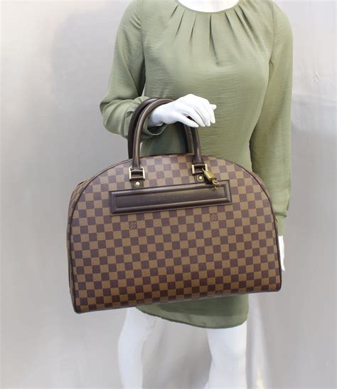 lv nolita damier price|LOUIS VUITTON Damier Ebene Nolita 1201490 .